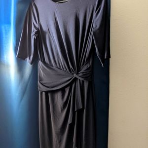 Laurens looks by Ralph Lauren black dress.